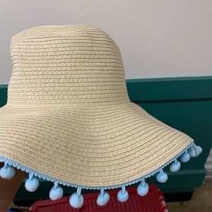 Straw beach Hat with turquoise Pom Pom tassels